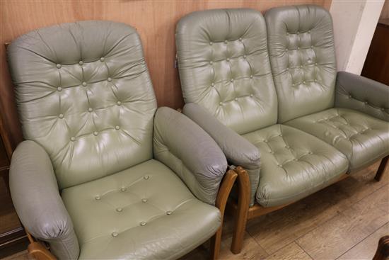 An Ercol sofa and chair, W.130cm